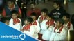 Niños triquis, campeones de basquetbol en Argentina, regresan a México