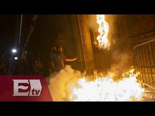 Actos vandálicos contra puerta de Palacio Nacional/ Comunidad