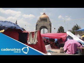 CNTE no se va, sólo reacomoda plantón / Marchas 2013