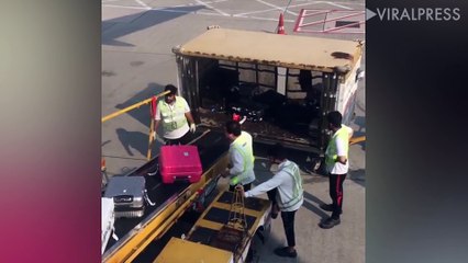Rough Baggage Handlers At Hong Kong Airport