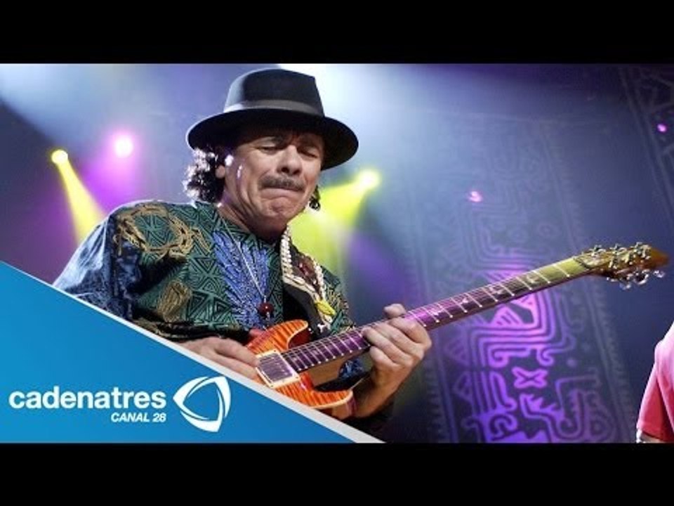 Carlos Santana es reconocido por Obama / Carlos...
