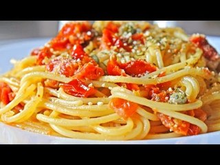 Spaghetti con jitomates y mantequilla de anchoa