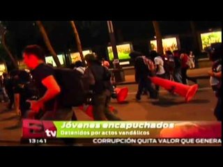 Detenidos cinco encapuchados por actos vandálicos en marcha por Ayotzinapa/ Comunidad