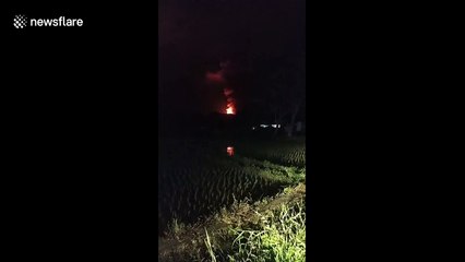Sky lights up during volcanic lava eruptions in Indonesia