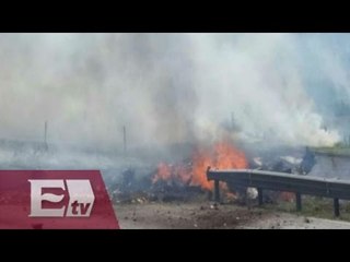 Avioneta se estrella en carretera México-Querétaro / Titulares de la tarde