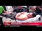 Policías heridos en emboscada son trasladados a Morelia / Vianey Esquinca