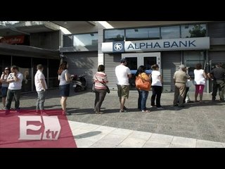 Bancos en Grecia vuelven a sus actividades / Titulares de la tarde
