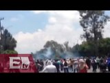 Enfrentamiento entre normalistas y policías en Michoacán
