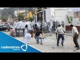 Enfrentamientos en San Bartolo dejan 50 policías heridos (VIDEO)