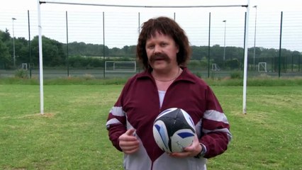 Keith Fitt tries and fails to demonstrate how to play rugby