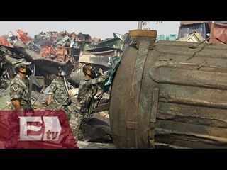 Toneladas de cianuro amenazan el puerto de Tianjin tras explosión / Titulares de la tarde
