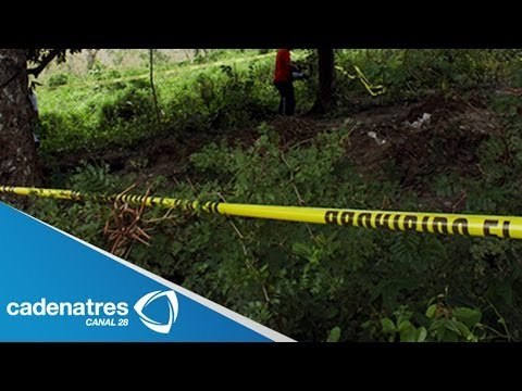 En Veracruz hallan 31 cuerpos semi enterrados en fosa / 31 bodies found in Veracruz