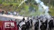 Normalistas de Ayotzinapa se enfrentan a policías en Guerrero / Titulares de la Noche
