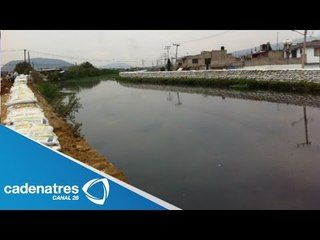 Canal en Valle de Chalco incrementa nivel por fuertes lluvias