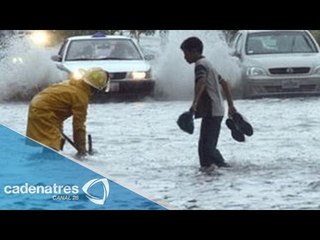 Capitalinos sorprendidos por las fuertes lluvias / Tropical Storm Dolly