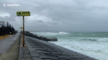 Waves crash on Okinawa beach as typhoon brings strong winds and rains to Japan's south