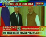 PM Narendra Modi meets Russia President Vladimir Putin
