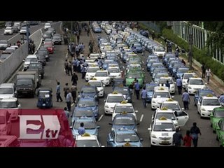 Taxistas de Indonesia se enfrentan a operadores de Uber / Martín Espinosa