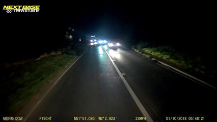 Terrifying moment overhanging load from HGV slams into truck driver's cab