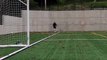 Lad juggles the football by the corner flag then curves the ball into the net