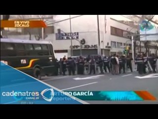 Policias esperan a manifestantes en la Ciudad de México
