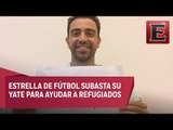 Futbolista subasta yate para ayudar a refugiados