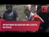 38 normalistas detenidos tras enfrentamiento con policías en Michoacán