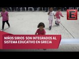 Maestros dan clases a refugiados sirios en Grecia