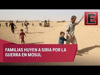 Cientos de familias huyen de la guerra en Mosul