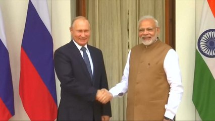 Russia's Putin And India's Modi Exchange Hugs In Celebration Of $5bn Defense Deal