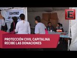 Instalan centro de acopio en el Zócalo capitalino para afectados de Tultepec