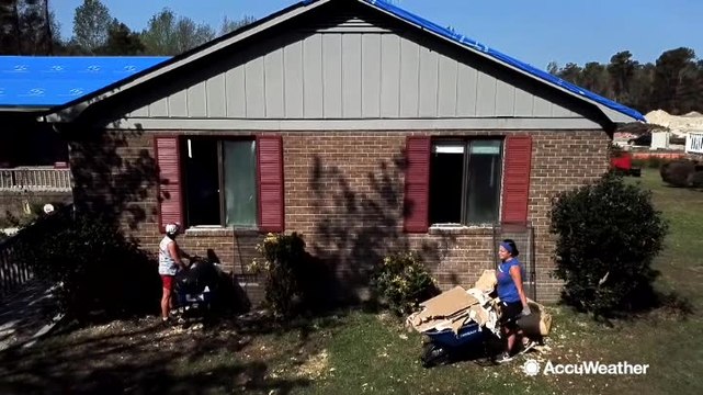Cleaning up after Florence floodwaters destroyed homes