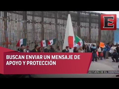Activistas de Tijuana forman muro humano en apoyo a migrantes