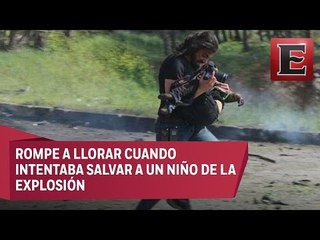 Fotógrafo socorre a un niño víctima de un atentado en Alepo