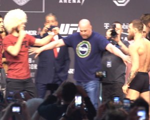 Brief flare up as UFC fighters weigh in