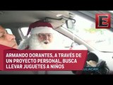 Santa Claus taxista se prepara para llevar decenas de sonrisas
