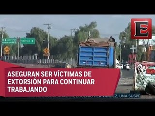 Amenazan a choferes que transportan materiales para el AICM