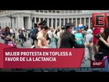 Detienen a mujer por protestar en topless a favor de la lactancia