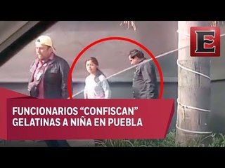 Captan a sujetos quitándole gelatinas a niña en Puebla