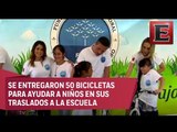 Conductores de Grupo Imagen le entregan bicicletas a niños de escasos recursos