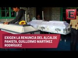 Sepultan a hombres linchados en Puebla entre demandas de justicia