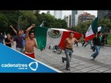 Aficionados festejan en Ángel de la Independencia triunfo de la selección mexicana