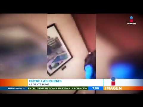 ¡Huyen entre las ruinas de un edificio! | Noticias con Francisco Zea