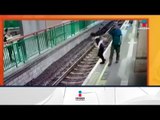 Hombre empuja a mujer a las vías del tren sin razón alguna | Noticias con Francisco Zea