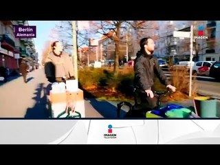 Descargar video: Jovenes en bicicleta reparten café y cobijas a indigentes | Noticias con Yuriria Sierra