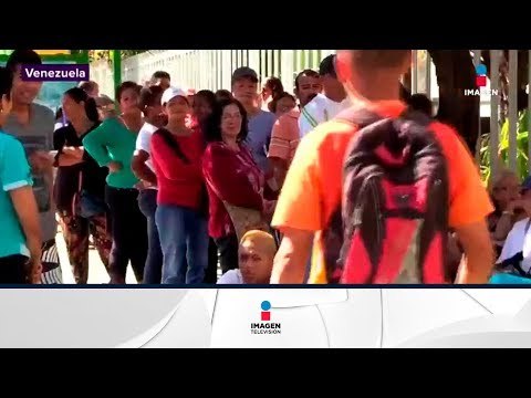 Largas filas y saqueos en supermercados en Venezuela cuando anunciaron baja de precios