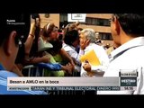 Reciben a AMLO con beso en la boca en Azcapotzalco | Noticias con Yuriria Sierra