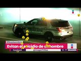Policía alineó 13 camiones para evitar suicidio | Noticias con Yuriria Sierra