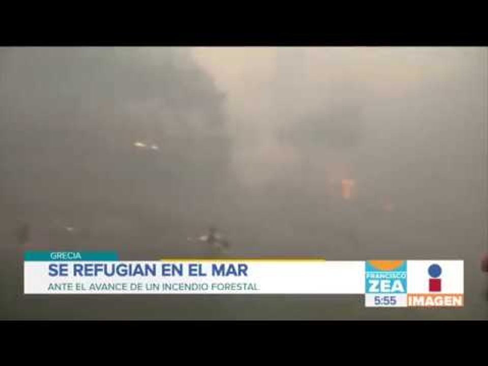 Decenas de personas se refugian en mar para huir del fuego | Noticias con Francisco Zea