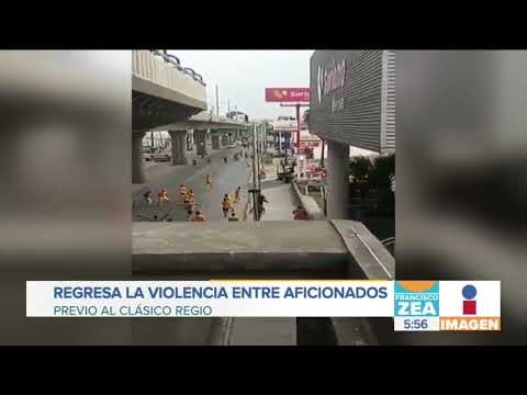 Aficionados de Monterrey y Tigres se agarran a golpes en la calle | Noticias con Zea
